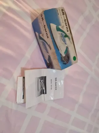 Plancha de viaje 700W con vapor