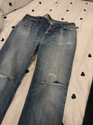 Pantalón vaquero Lee W38 Rotos