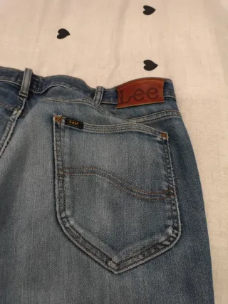 Pantalón vaquero Lee W38 Rotos