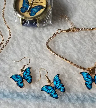 Conjunto bisutería mariposa azul y dorado