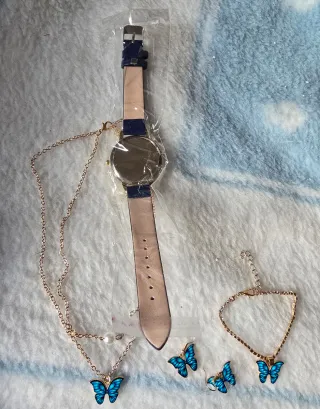 Conjunto bisutería mariposa azul y dorado