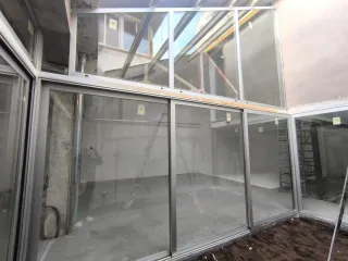 Ventanas y Puertas Cerramientos de PVC y Aluminio