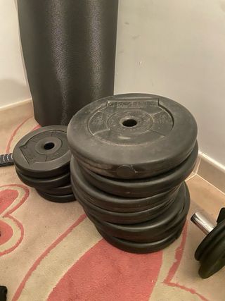 Banco musculación y discos