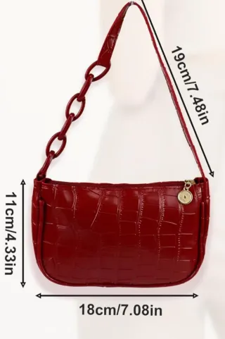 Bolso rojo con cadena