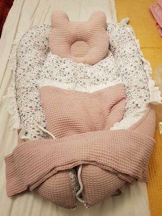 Ninho de bebé rosa com laço