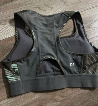 Top deportivo Asics verde oliva y turquesa