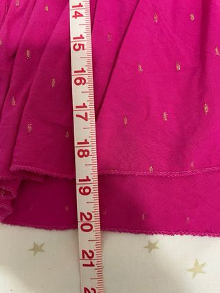 Blusa rosa con destellos dorados