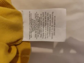 Jersey Carolina Herrera cuello V amarillo