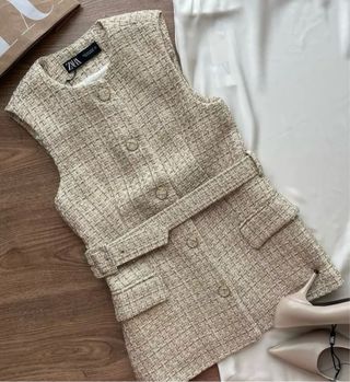 Chaleco tweed con cinturón