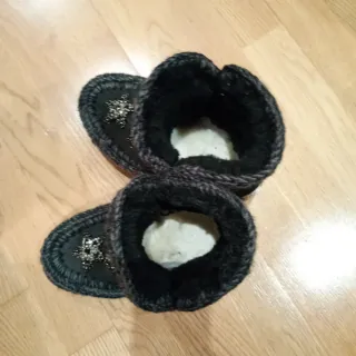 Botas MOU negras con estrellas plateadas