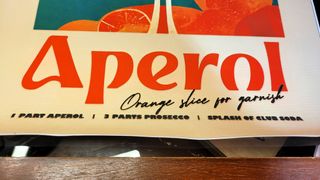 Retrò Aperol Canvas Club Bar arredamento