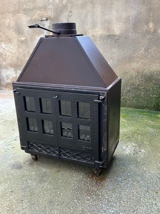 Chimenea hierro fundido con puertas de cristal