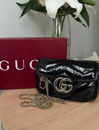 Bolso Gucci Negro Charol GG Dorado