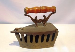 Plancha antigua de carbón