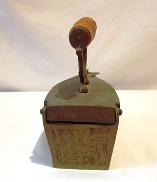 Plancha antigua de carbón