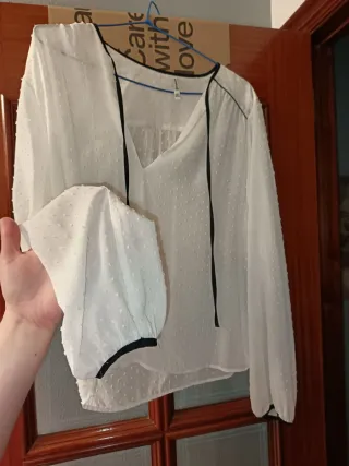 Blusa blanca topos talla L