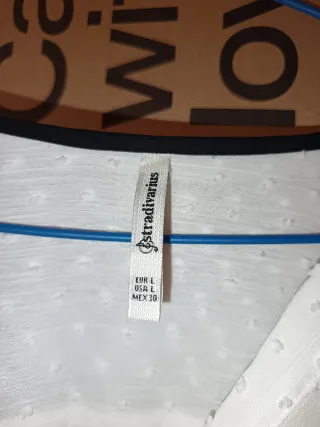 Blusa blanca topos talla L