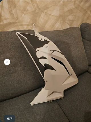 Lateral Aprilia RS 50 con diseño de león