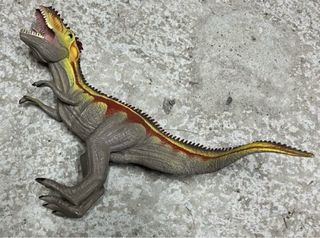 Giocattoli dinosauri T-Rex e Giganotosaurus