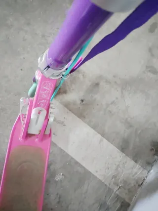 Patinete Oxelo rosa y morado