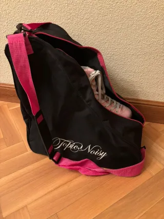 Patines 4 ruedas Oxelo rosas y mochila.