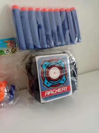 Juguete pistola con balas y diana abatible nuevo