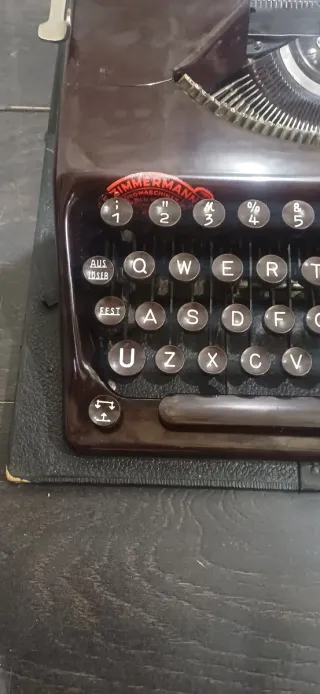 Máquina de escribir Olympia Plana Vintage