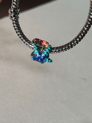 Charm Doble Estrella de Mar Plata. NUEVO