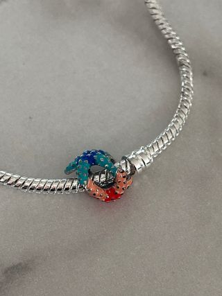 Charm Doble Estrella de Mar Plata. NUEVO