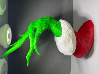 Mano Grinch Navideña