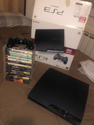 PS3 SLIM con caja, mando y 15 juegos
