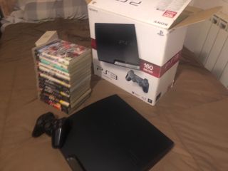 PS3 SLIM con caja, mando y 15 juegos