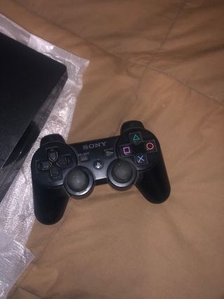 PS3 SLIM con caja, mando y 15 juegos