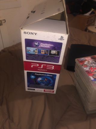 PS3 SLIM con caja, mando y 15 juegos
