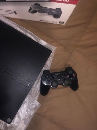 PS3 SLIM con caja, mando y 15 juegos