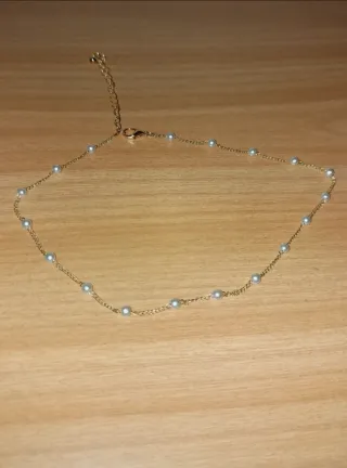 Collare da donna con perle dorate