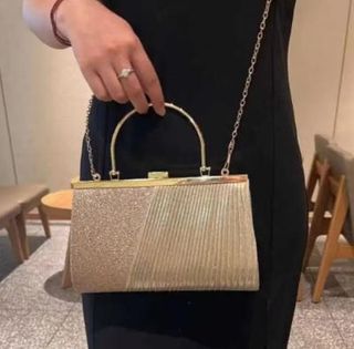 Bolso de fiesta dorado y rosa con brillo