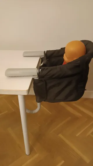 Trona de viaje plegable