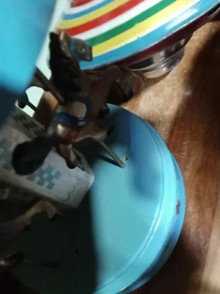 Tiovivo musical vintage caballitos