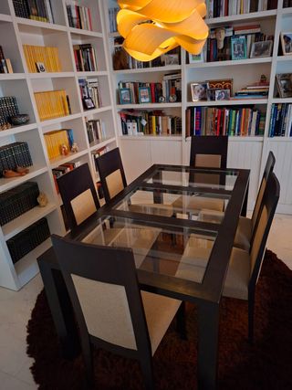 Mesa de comedor de hierro forjado negra y cristal