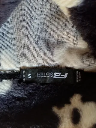 Chaleco floral negro y blanco