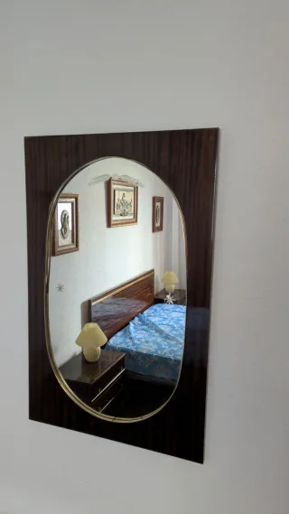 Espejo de pared de madera y cristal