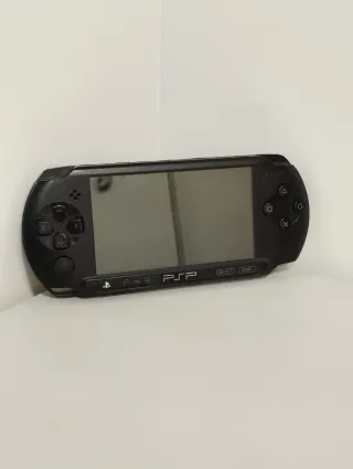 Consola PSP Sony + 4 UMDs + Tarjeta 4GB