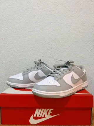 Zapatillas Nike Dunk Low Retro.Blancas y Grises