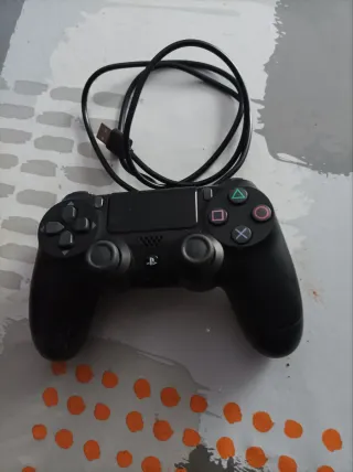 PS4 + Mando + 25Juegos