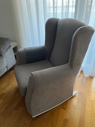 Sillón balancín tapizado