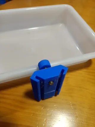 Soporte y bandeja para cañas de pescar