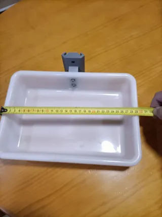 Soporte y bandeja para cañas de pescar