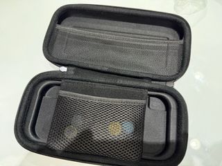 Nintendo Switch Lite Verde con Funda Rosa