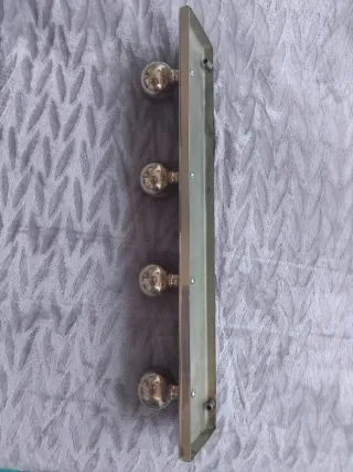 Perchero de pared laton